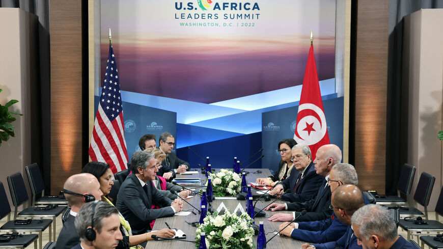 U.S. Secretary of State Antony Blinken (L) meets with Tunisian President Kais Saied (R).