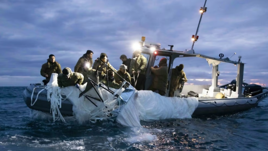 US sailors recover part of a Chinese high-altitude surveillance balloon off the coast of Myrtle Beach, South Carolina, on Feb. 5.