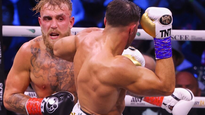 Jake Paul (left) was beaten on points by Tommy Fury (right)