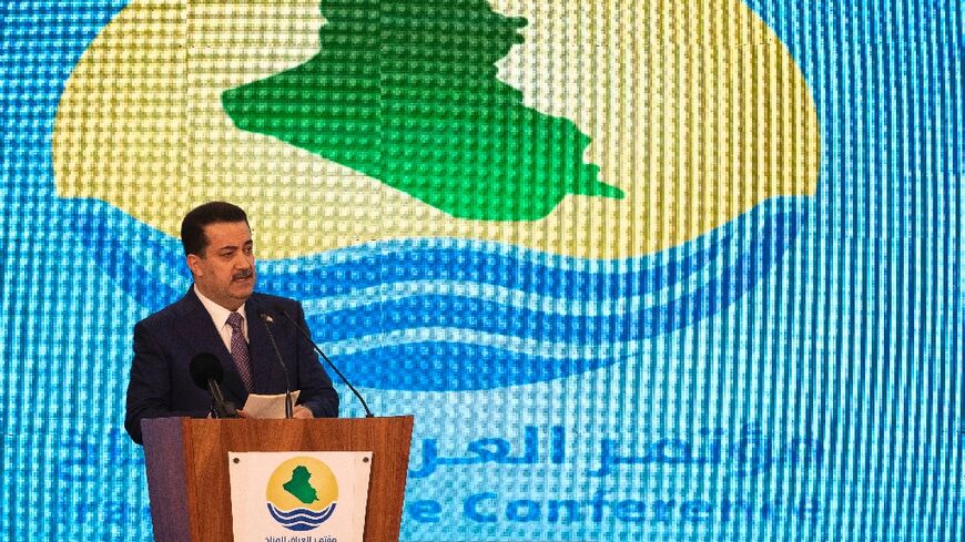 Iraq's Prime Minister Mohammed Shia al-Sudani delivers a speech during the Iraq Climate Conference in Basra on March 12, 2023