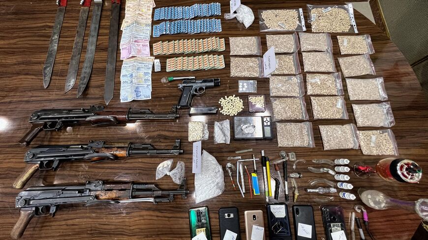Seized drugs, including Captagon, are displayed for the media in the town of Marea, in the northern Aleppo countryside, on May 24, 2022, following clashes among different Turkey-backed factions in Syria. - A decade of appalling civil war has left Syria fragmented and in ruins but one thing crosses every frontline: the drug fenethylline, commercially known as captagon. The stimulant -- once notorious for its association with Islamic State fighters -- has spawned an illegal $10-billion industry that not only
