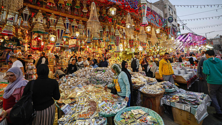 People buy traditional lanterns and foodstuff ahead of the holy Muslim month of Ramadan at the market Sayyida Zeinab district, Cairo, Egypt, March 12, 2023.