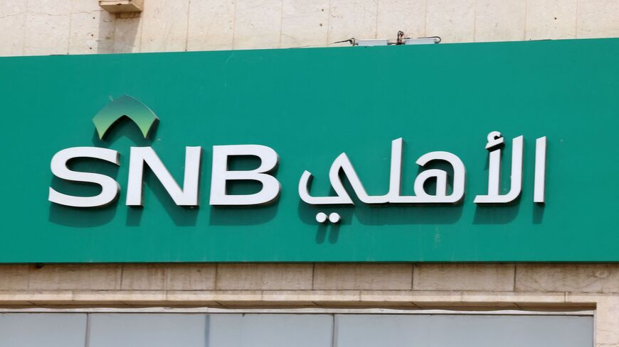 The logo of the Saudi National Bank (SNB) can be seen at a branch in Riyadh on March 27, 2023, after the chairman of SNB, the main shareholder of troubled lender Credit Suisse which was bought out this month, resigned. 