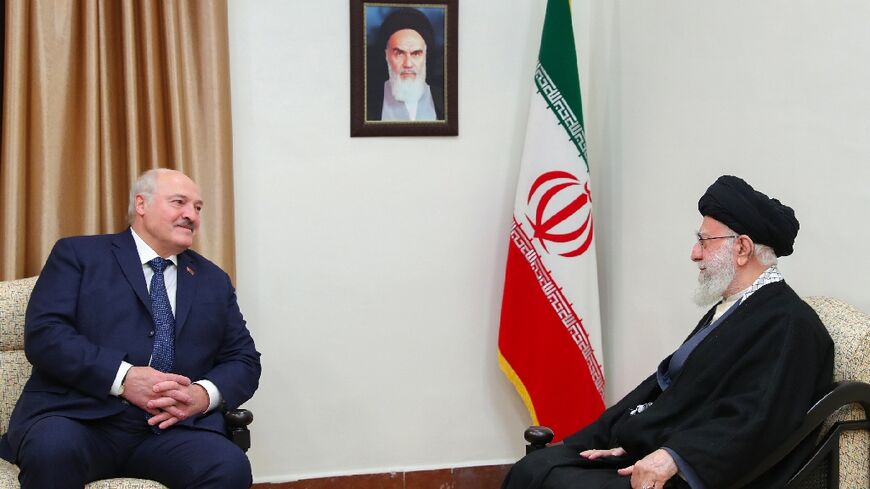 Iran's supreme leader Ayatollah Ali Khamenei (R), who met with Belarus President Alexander Lukashenko in Tehran, said sanctioned countries should 'work together'