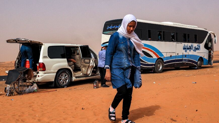 A rest stop on the route which thousands are trying to take north, at al-Gabolab in Sudan's Northern State