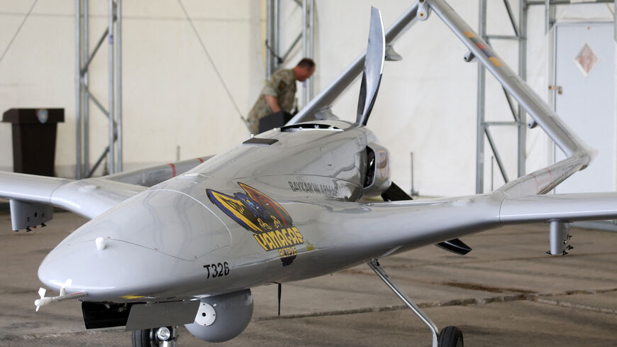 A Turkish Bayraktar TB2 combat drone is on view during a presentation at the Lithuanian Air Force Base in Siauliai, Lithuania, on July 6, 2022. - 