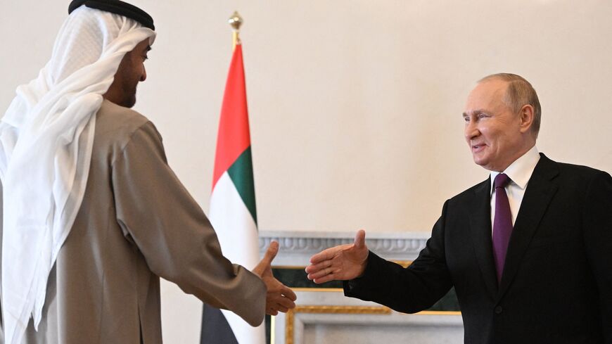 Russian President Vladimir Putin meets with United Arab Emirates President Sheikh Mohamed bin Zayed Al-Nahyan in Saint Petersburg on Oct. 11, 2022. 