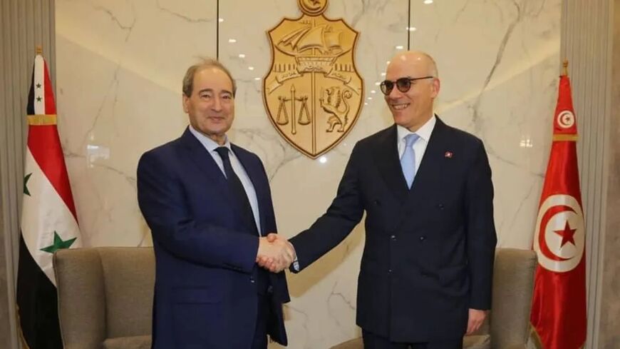 Tunisian Foreign Minister Nabil Ammar (R) meets Syrian Foreign Minister Faisal Mekdad (L) during an official visit in Tunis, Tunisia on April 17, 2023 (Tunisian Foreign Ministry)