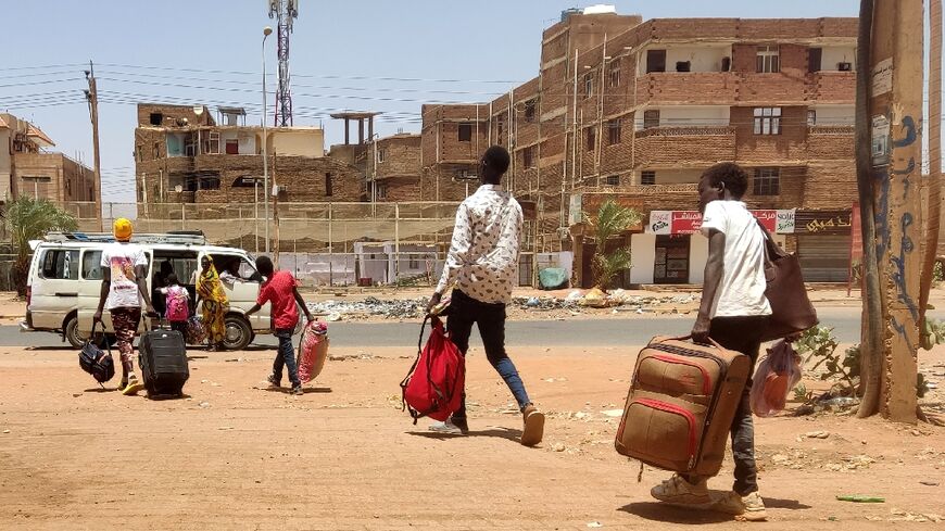 Nearly one million people have been uprooted by the war, with long refugee convoys headed to Egypt, Ethiopia, Chad and South Sudan