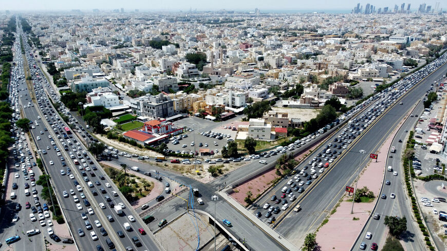 An aerial picture shows heavy traffic on two main highways in Kuwait City on March 27, 2023, after heavy rain the previous night caused flooding and road closures. (Photo by YASSER AL-ZAYYAT / AFP) (Photo by YASSER AL-ZAYYAT/AFP via Getty Images)