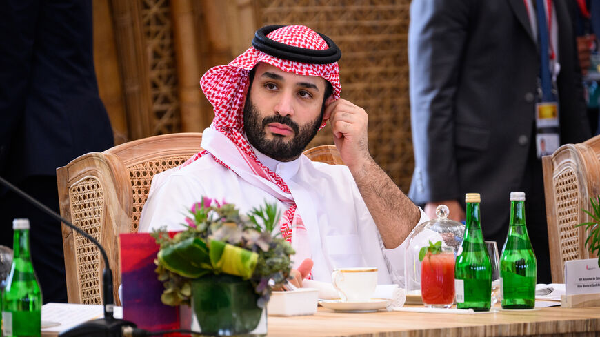 Crown Prince Mohammed bin Salman of Saudi Arabia takes his seat ahead of a working lunch at the G-20 Summit, Nusa Dua, Indonesia, Nov. 15, 2022.