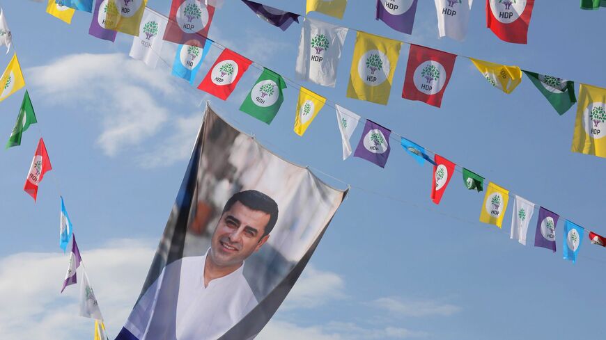 A picture shows election flags displaying imprisoned Selahattin Demirtas.