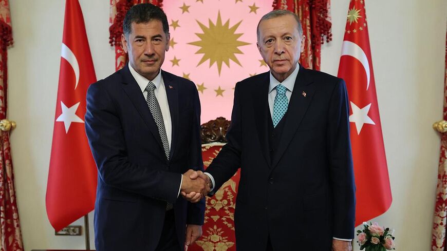 Sinan Ogam and Recep Tayyip Erodgan