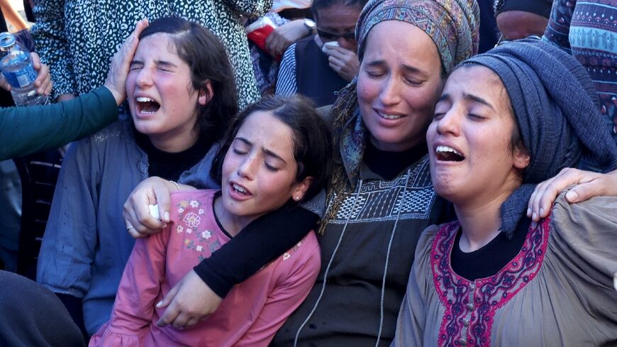 Relatives mourn at the funeral of 17-year-old Israeli, Nahman Mordof, killed by Palestinian gunmen outside a Jewish settlement in the West Bank on Tuesday