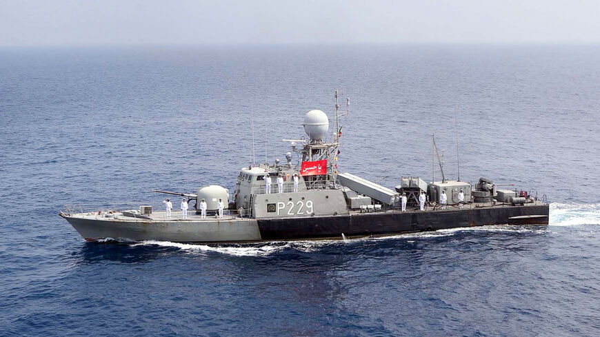 A handout picture provided by the Iranian army official website shows an Iranian naval ship parading during the last day of a military exercise in the Gulf, near the strategic Strait of Hormuz, Iran, Sept. 12, 2020.