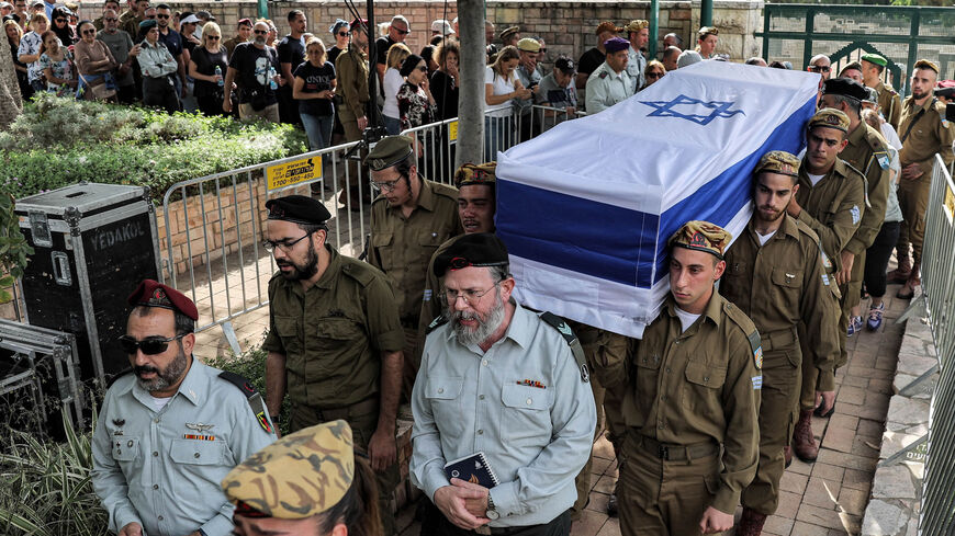 Israeli soldiers carry the coffin of Lia Ben Nun, one of three soldiers killed in the cross-border incident with Egypt, during the funeral in Rishon Lezion, June 4, 2023.