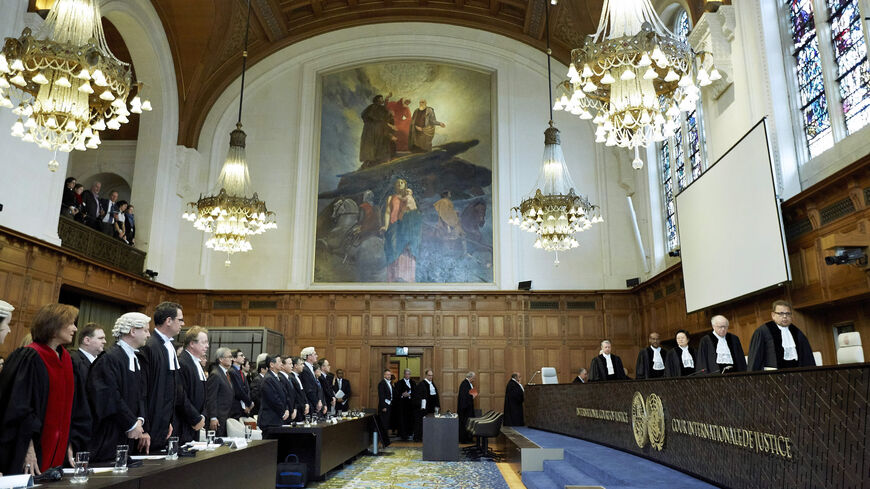 Judges enter the courtroom prior to the verdict in the case against Japanese whaling at the International Court of Justice, The Hague, Netherlands, March 31, 2014.