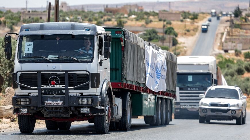 The 10-truck UN aid convoy crosses into Syria's rebel-held Al-Nayrab, headed for storage facilities near the Turkish border