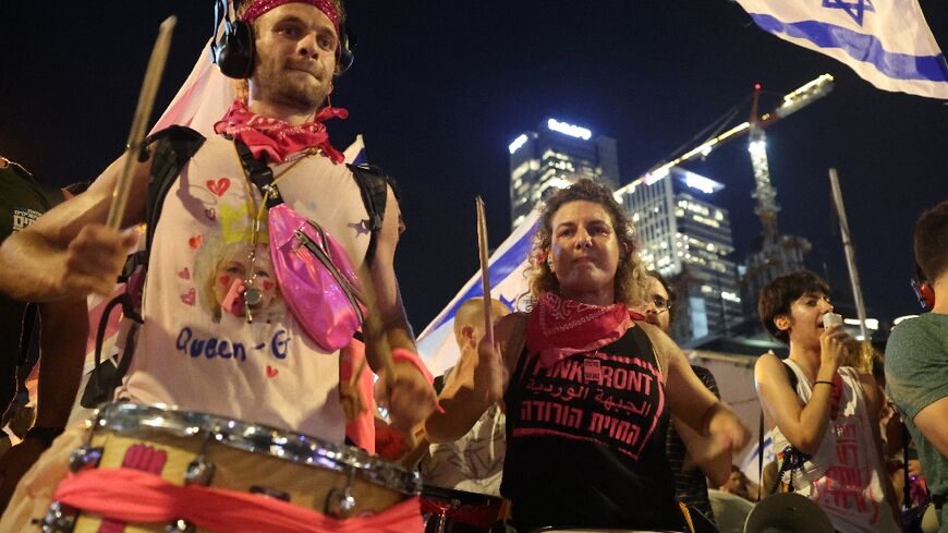 Protesters march in Tel Aviv against the judicial reforms 