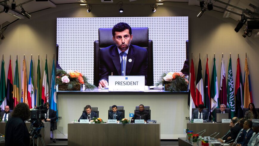 OPEC President UAE Energy Minister Suhail al-Mazrouei (C) speaks as he sits with Minister of Energy of Russia Alexander Novak (left) and OPEC Secretary General Mohammed Sanusi Barkindo (r) of Nigeria during a meeting at the headquarters of the Organization of the Petroleum Exporting Countries (OPEC) with OPEC members and non-OPEC members in Vienna, Austria on December 7, 2018. (Photo by JOE KLAMAR / AFP) (Photo credit should read JOE KLAMAR/AFP via Getty Images)