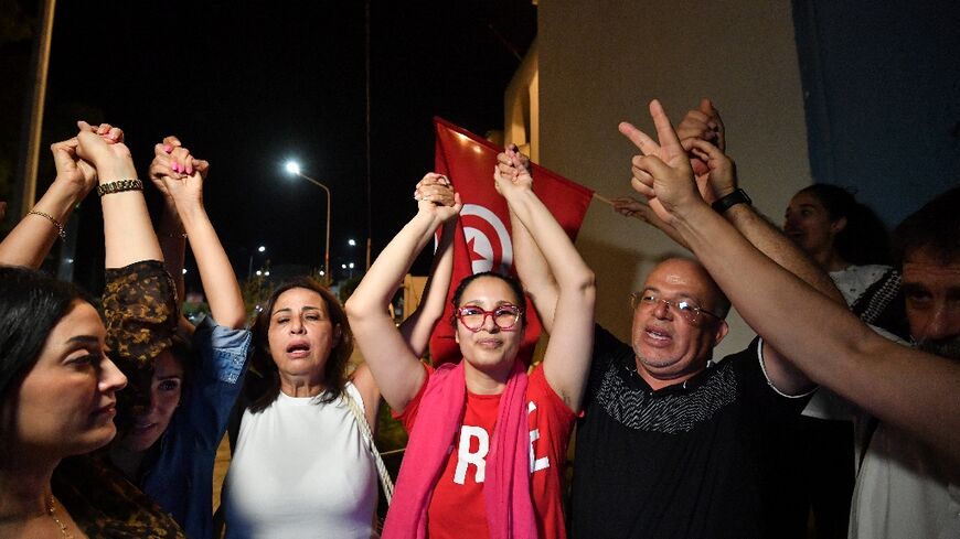 Chaima Issa greets her family and supporters upon release from prison near Tunis