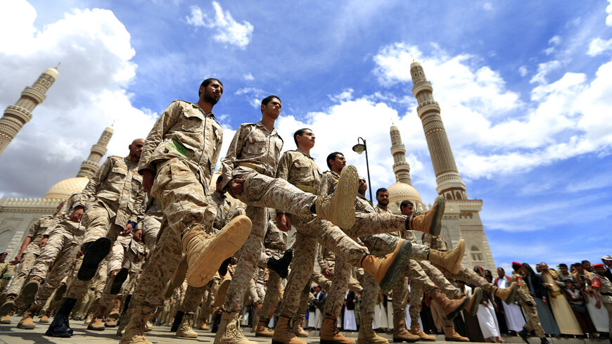 Huthi forces take part in funeral ceremony for Yahya Al-Shami, assistant supreme commander of the Houthi forces, a day after his death due to Covid-19 pandemic, in Yemen's capital Sanaa on April 27, 2021.