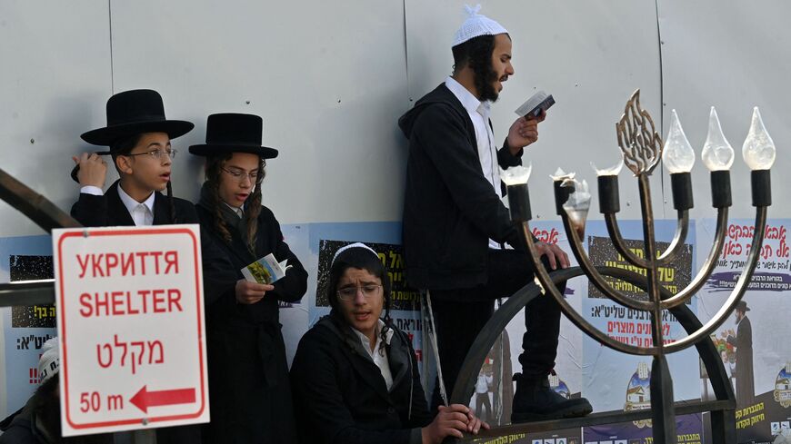 Hasidic Jewish pilgrims pray at the tomb of Rabbi Nachman for Rosh Hashana, the Jewish new year, in the town of Uman, about 200km from the Ukrainian capital of Kyiv, on Sept. 25, 2022.