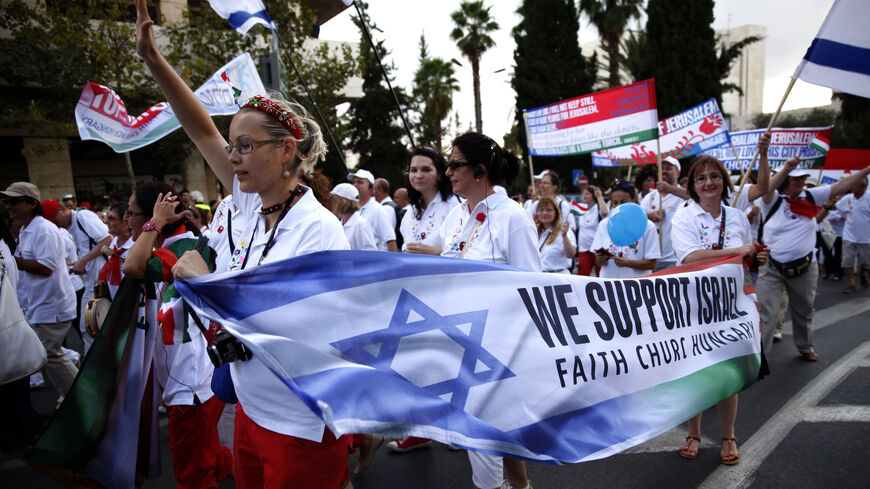 Evangelical Christian pilgrims from Hungary march during a parade in celebration of the Jewish holiday of Sukkot (Tabernacles) and to express solidarity with Israel, downtown Jerusalem, September 24, 2013.