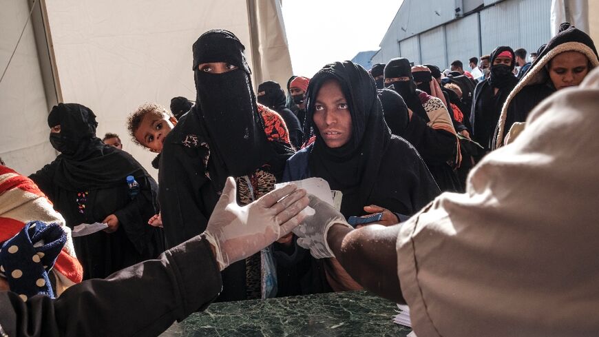 Ethiopians at the Bole Airport in Addis Ababa, on March 30, 2022, after their repatriation from Saudi Arabia