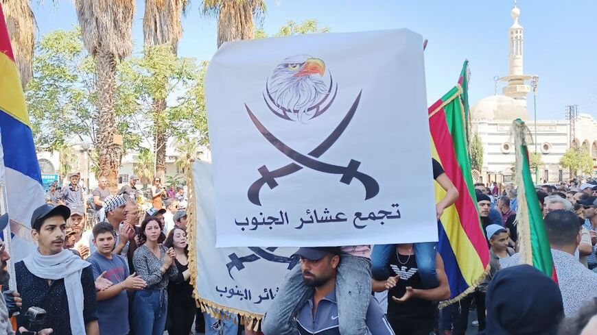 Protests in Al-Karama Square in the center of Suwayda, Sunday Aug. 27, 2023.