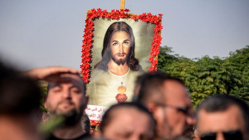 Around 20 coffins covered in satin or bouquets of flowers were carried through the crowd on the shoulders of men