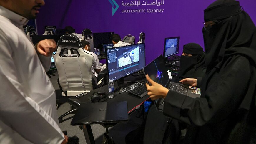 Saudi trainees attend a training course at the Saudi Esport Academy in Riyadh