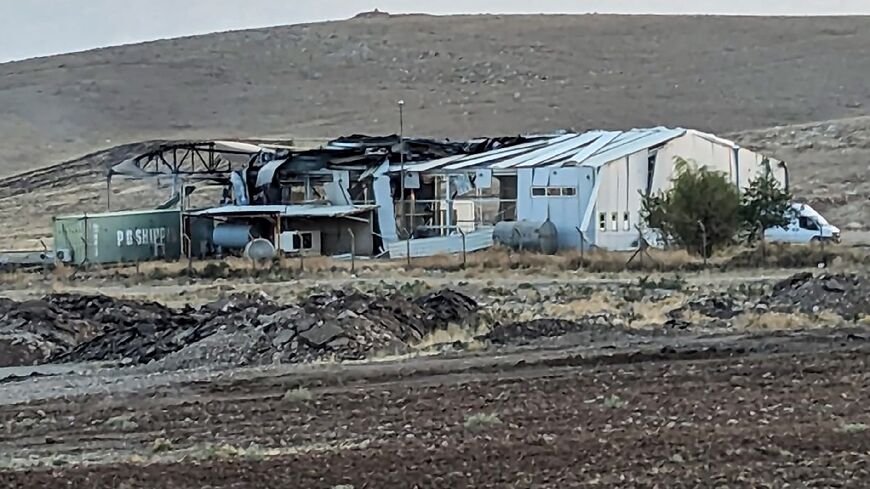 Buildings at the airfield pictured after the drone strike