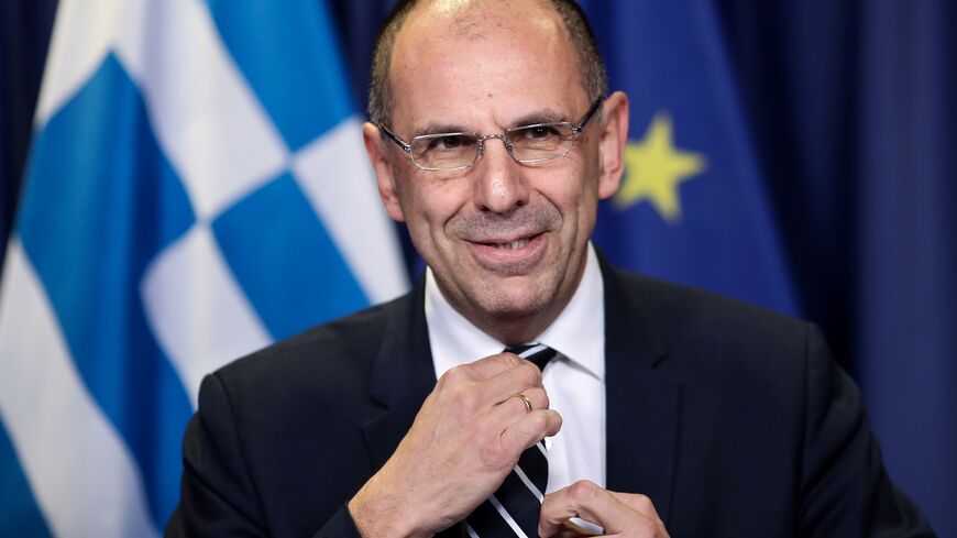 Greek State Minister Giorgos Gerapetritis gestures as he speaks during a press conference at the European Council in Brussels on March 4, 2020. (Photo by Kenzo TRIBOUILLARD / AFP) (Photo by KENZO TRIBOUILLARD/AFP via Getty Images)