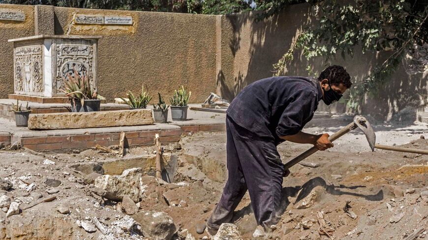 A cemetery demolition amidst ongoing roadworks at the historic City of the Dead.