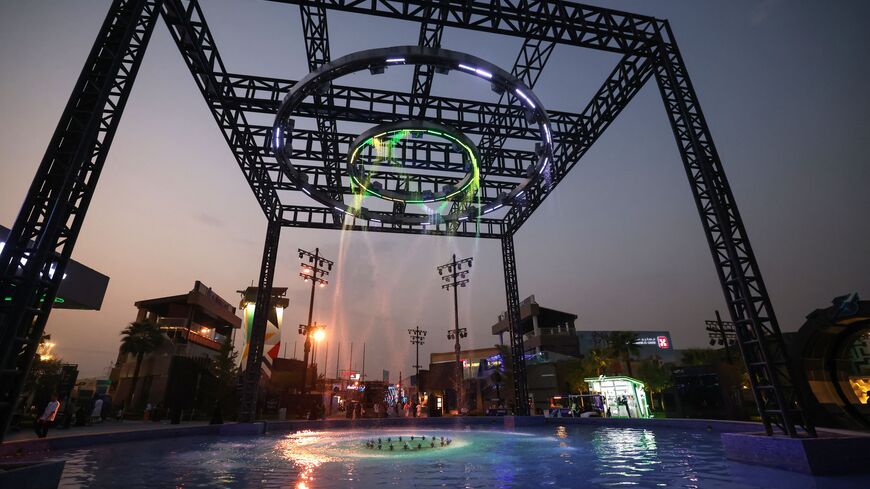 People watch a water curtain fountain at the Boulevard entertainment city in Riyadh on August 29, 2023. (Photo by Fayez Nureldine / AFP) (Photo by FAYEZ NURELDINE/AFP via Getty Images)