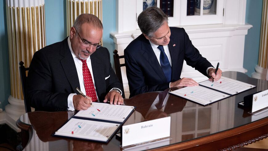 Bahrain's Prime Minister and Crown Prince Salman bin Hamad al-Khalifa and US Secretary of State Antony Blinken sign a security integration and prosperity agreement at the US Department of State on September 13, 2023, in Washington, DC. (Photo by Brendan Smialowski / AFP) (Photo by BRENDAN SMIALOWSKI/AFP via Getty Images)