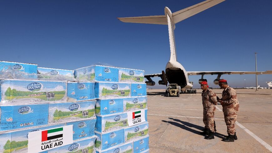 Aid supplied by the United Arab Emirates for survivors of floods that submerged Libya's eastern city of Derna arrives in Benghazi