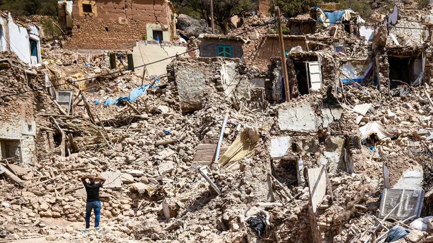 A villager looks at destroyed houses in Douzrou on September 12, 2023, following the 6.8-magnitude earthquake