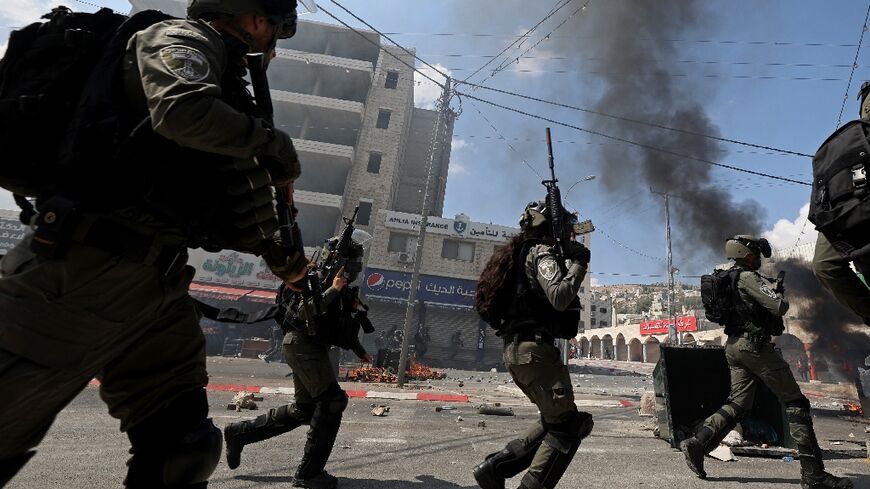 Israeli soldiers deploy during the funeral of Labib Damidi