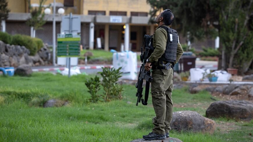 An Israeli soldier assigned to protect kibbutz Dafna on the border with Lebanon, October 30, 2023.