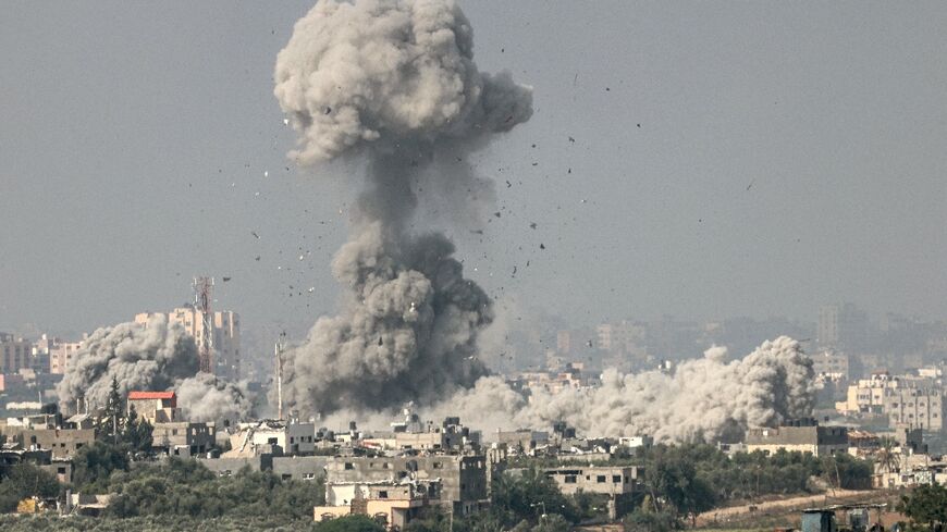 Smoke billows above the northern Gaza Strip following an Israeli strike, in an image taken from the southern Israeli city of Sderot on October 23, 2023