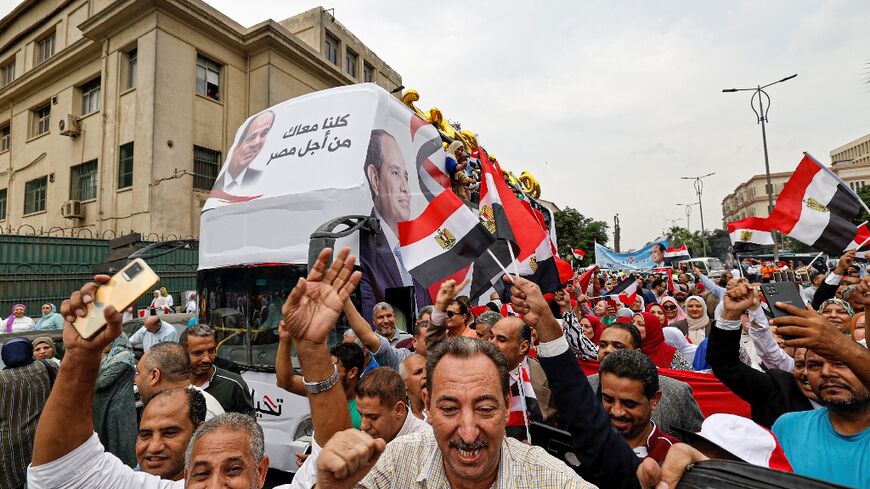 While Egypt's Sisi has yet to announced his intention to run, crowds gathered in Cairo to show support