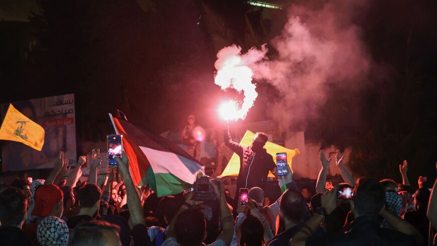 a rally in front of the French embassy complex in Beirut early on October 18, 2023, in support of Palestinians after a strike on the Ahli Arab hospital in central Gaza that killed hundreds. Israel and Palestinians traded blame for the incident, which an "outraged and deeply saddened" US President Joe Biden denounced while en route to the Middle East. (Photo by ANWAR AMRO / AFP) (Photo by ANWAR AMRO/AFP via Getty Images)