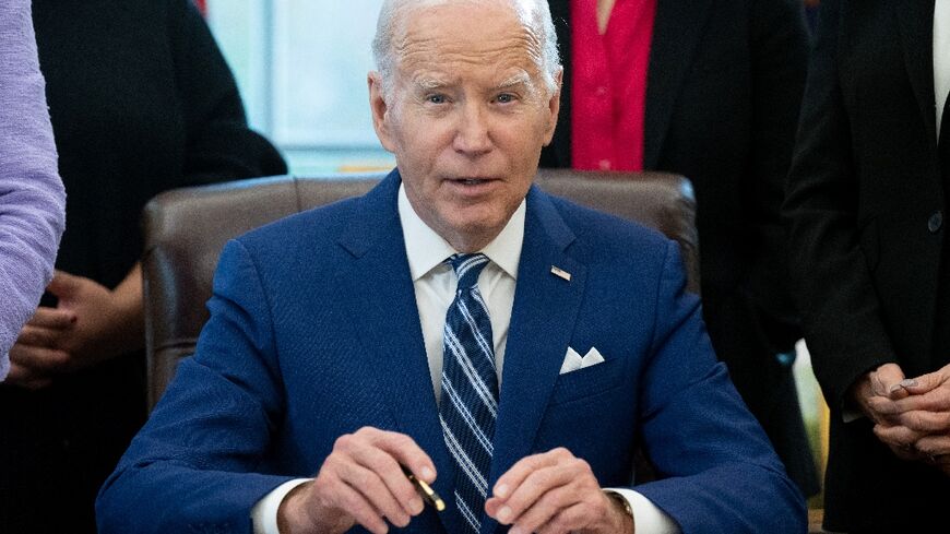 US President Joe Biden speaks after signing a Presidential Memorandum that will establish the first-ever White House Initiative on Women’s Health Research in the Oval Office of the White House