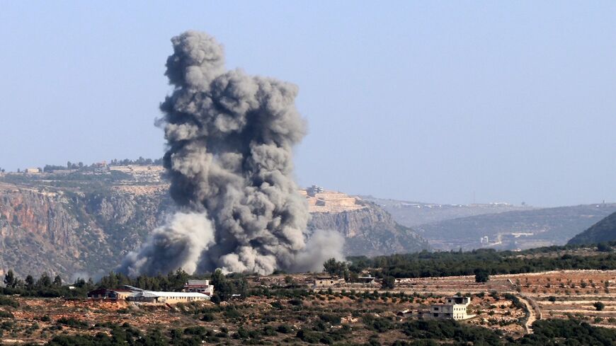 Smoke billows from the site of an Israeli strike in Lebanon's southern village of Jibbayn near the boder with northern Israel on November 23, 2023