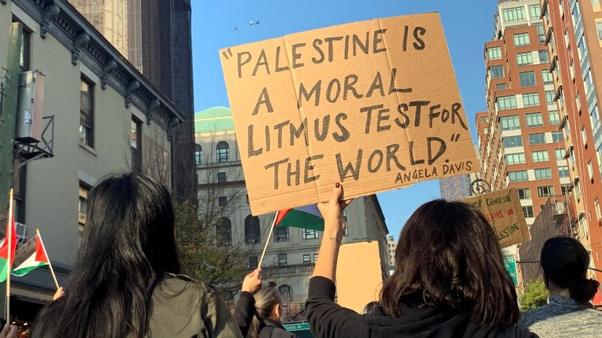 Demonstrators march during the "Palestine to Africa - Palestinian Liberation is Black Liberation" protest in New York on November 5, 2023