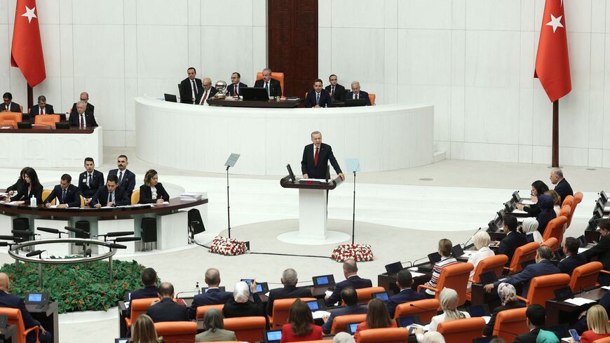 Turkish President Recep Tayyip Erdogan addresses the parliament.