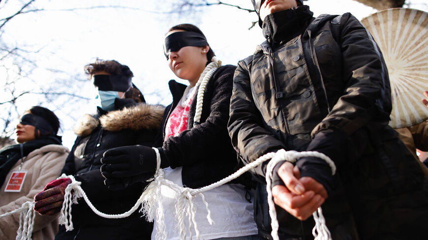 People protest against executions and detentions in Iran, in front of the Iranian Permanent Mission to the UN in New York City on December 17, 2022. (Photo by Kena Betancur / AFP) (Photo by KENA BETANCUR/AFP via Getty Images)