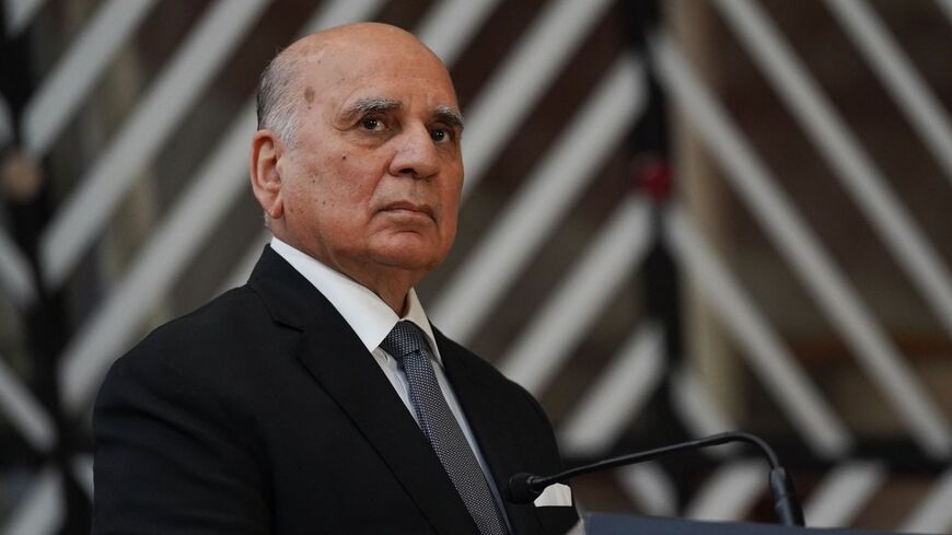 Iraqi Foreign Minister Fuad Hussein talks to the press during a EU-Iraq Cooperation Council, at the European Council Building in Brussels on March 19, 2023. 